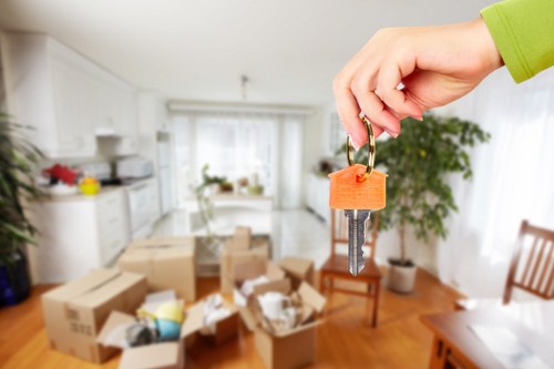 A local removals team handling boxes and household items