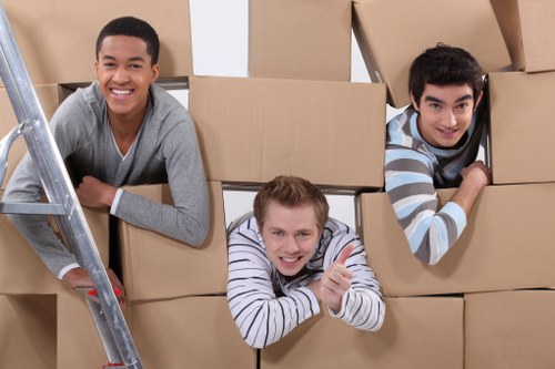 Local packing team working in a Harrow flat with access challenges