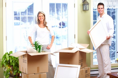 Prepared moving boxes and furniture ready for local removals in Harrow